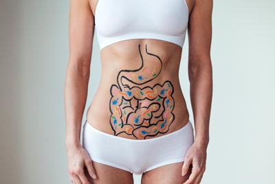 Darmflora Bakterien Frau mit Darm auf den Bauch gemalt
